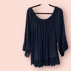 Super cute navy blue blouse w/crocheted, bell sleeves and crocheted hem.